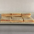 24 Sándwiches de jamón en pan blanco de copetín